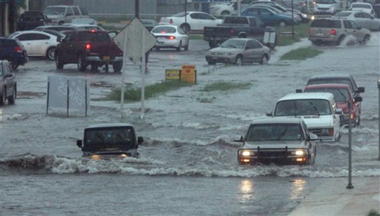 The access road off South Padre Island Drive in Corpus Christi, Texas, near Weber Road is chaotic as drivers look for higher ground during flooding on Sunday.